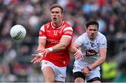 27 April 2025; Conor Grimes of Louth in action against David Hyland of Kildare during the Leinster GAA Football Senior Championship semi-final match between Kildare and Louth at Glenisk O'Connor Park in Tullamore, Offaly. Photo by Shauna Clinton/Sportsfile