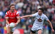 27 April 2025; Conor Grimes of Louth in action against David Hyland of Kildare during the Leinster GAA Football Senior Championship semi-final match between Kildare and Louth at Glenisk O'Connor Park in Tullamore, Offaly. Photo by Shauna Clinton/Sportsfile
