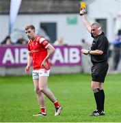 27 April 2025; Referee Brendan Griffin shows Peter Lynch of Louth a yellow card during the Leinster GAA Football Senior Championship semi-final match between Kildare and Louth at Glenisk O'Connor Park in Tullamore, Offaly. Photo by Shauna Clinton/Sportsfile
