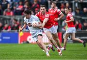 27 April 2025; David Hyland of Kildare is tackled by Sam Mulroy of Louth during the Leinster GAA Football Senior Championship semi-final match between Kildare and Louth at Glenisk O'Connor Park in Tullamore, Offaly. Photo by Shauna Clinton/Sportsfile