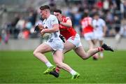 27 April 2025; Colm Dalton of Kildare is tackled by Kieran McArdle of Louth during the Leinster GAA Football Senior Championship semi-final match between Kildare and Louth at Glenisk O'Connor Park in Tullamore, Offaly. Photo by Shauna Clinton/Sportsfile