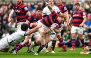 27 April 2025; Hugh Cooney of Clontarf is tackled by Luke Masters of Cork Constitution during the Energia All-Ireland League Men's Division 1A final match between Clontarf and Cork Constitution at the Aviva Stadium in Dublin. Photo by Matt Browne/Sportsfile