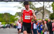 27 April 2025; Dylan Casey of Ennis Track AC crosses the finish line to win the men's senior relay during the 123.ie National Road Relay Championships in Raheny, Dublin. Photo by Tyler Miller/Sportsfile