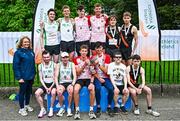27 April 2025; Athletics Ireland president Bríd Golden, left, with senior men's medalists Ennis Tarck AC, Clare, gold, Craughwell AC, Galway, silver, and Clonliffe Harriers AC, bronze, during the 123.ie National Road Relay Championships in Raheny, Dublin. Photo by Tyler Miller/Sportsfile