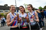 27 April 2025; Senior women's gold medalists, from left, Maria McCambridge, Eimear Maher and Emma McEvoy of Dundrum South Dublin AC, Dubin, during the 123.ie National Road Relay Championships in Raheny, Dublin. Photo by Tyler Miller/Sportsfile