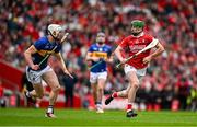 27 April 2025; Séamus Harnedy of Cork in action against Bryan O'Mara of Tipperary during the Munster GAA Hurling Senior Championship Round 2 match between Cork and Tipperary at SuperValu Páirc Uí Chaoimh in Cork. Photo by Brendan Moran/Sportsfile
