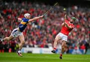 27 April 2025; Séamus Harnedy of Cork in action against Bryan O'Mara of Tipperary during the Munster GAA Hurling Senior Championship Round 2 match between Cork and Tipperary at SuperValu Páirc Uí Chaoimh in Cork. Photo by Brendan Moran/Sportsfile