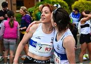 27 April 2025; Edel Martyn of Dunboyne AC, Meath, left, is embraced by team-mate Jane Bandila after finishing third in the women's masters event during the 123.ie National Road Relay Championships in Raheny, Dublin. Photo by Tyler Miller/Sportsfile