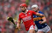 27 April 2025; Brian Hayes of Cork in action against Michael Breen of Tipperary during the Munster GAA Hurling Senior Championship Round 2 match between Cork and Tipperary at SuperValu Páirc Uí Chaoimh in Cork. Photo by Brendan Moran/Sportsfile