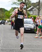27 April 2025; Eoghain McGinley of Letterkenny AC, Donegal, celebrates after winning the men's masters 35+ event during the 123.ie National Road Relay Championships in Raheny, Dublin. Photo by Tyler Miller/Sportsfile