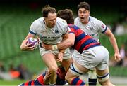 27 April 2025; Sean French of Cork Constitution is tackled by Charlie Ward and Oran Walsh of Clontarf during the Energia All-Ireland League Men's Division 1A final match between Clontarf and Cork Constitution at the Aviva Stadium in Dublin. Photo by Matt Browne/Sportsfile