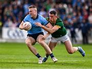 27 April 2025; Paddy Small of Dublin is tackled by Donal Keogan of Meath during the Leinster GAA Football Senior Championship semi-final match between Dublin and Meath at Laois Hire O'Moore Park in Portlaoise, Laois. Photo by Ray McManus/Sportsfile