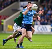 27 April 2025; Con O'Callaghan of Dublin is tackled by Brian O'Halloran of Meath during the Leinster GAA Football Senior Championship semi-final match between Dublin and Meath at Laois Hire O'Moore Park in Portlaoise, Laois. Photo by Ray McManus/Sportsfile