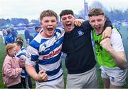 27 April 2025; Darragh Farrell of Athy, left, celebrates with supporters after their side's victory in the Bank of Ireland Provincial Towns Cup final match between Athy RFC and County Carlow FC at Forenaughts in Naas, Kildare. Photo by Seb Daly/Sportsfile