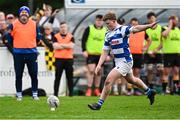 27 April 2025; Darragh Farrell of Athy kicks a penalty during the Bank of Ireland Provincial Towns Cup final match between Athy RFC and County Carlow FC at Forenaughts in Naas, Kildare. Photo by Seb Daly/Sportsfile