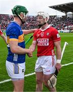 27 April 2025; Noel McGrath of Tipperary, left, and Patrick Horgan of Cork shake hands after the Munster GAA Hurling Senior Championship Round 2 match between Cork and Tipperary at SuperValu Páirc Uí Chaoimh in Cork. Photo by Brendan Moran/Sportsfile