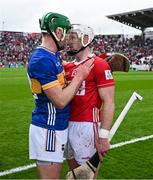 27 April 2025; Noel McGrath of Tipperary, left, and Patrick Horgan of Cork shake hands after the Munster GAA Hurling Senior Championship Round 2 match between Cork and Tipperary at SuperValu Páirc Uí Chaoimh in Cork. Photo by Brendan Moran/Sportsfile