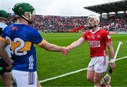 27 April 2025; Noel McGrath of Tipperary, left, and Patrick Horgan of Cork shake hands after the Munster GAA Hurling Senior Championship Round 2 match between Cork and Tipperary at SuperValu Páirc Uí Chaoimh in Cork. Photo by Brendan Moran/Sportsfile