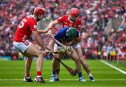 27 April 2025; Robert Doyle of Tipperary holds off the challenge of Brian Hayes, left, and Alan Connolly of Cork during the Munster GAA Hurling Senior Championship Round 2 match between Cork and Tipperary at SuperValu Páirc Uí Chaoimh in Cork. Photo by Brendan Moran/Sportsfile