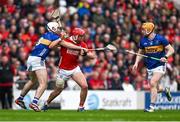 27 April 2025; Ciarán Joyce of Cork is tackled by Craig Morgan of Tipperary during the Munster GAA Hurling Senior Championship Round 2 match between Cork and Tipperary at SuperValu Páirc Uí Chaoimh in Cork. Photo by Brendan Moran/Sportsfile