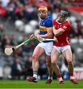 27 April 2025; Ronan Maher of Tipperary is shouldered by Darragh Fitzgibbon of Cork during the Munster GAA Hurling Senior Championship Round 2 match between Cork and Tipperary at SuperValu Páirc Uí Chaoimh in Cork. Photo by Brendan Moran/Sportsfile