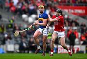 27 April 2025; Ronan Maher of Tipperary is shouldered by Darragh Fitzgibbon of Cork during the Munster GAA Hurling Senior Championship Round 2 match between Cork and Tipperary at SuperValu Páirc Uí Chaoimh in Cork. Photo by Brendan Moran/Sportsfile