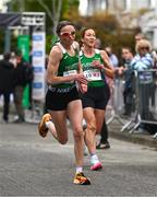 27 April 2025; Michelle Cox of Newbridge AC, Kildare, takesover from team-mate Emma Boland whilst competing in the womne's masters event during the 123.ie National Road Relay Championships in Raheny, Dublin. Photo by Tyler Miller/Sportsfile