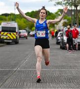 27 April 2025; Ashley Ryan of Longford AC, Longford, celebrates after winning the womne's masters event competes during the 123.ie National Road Relay Championships in Raheny, Dublin. Photo by Tyler Miller/Sportsfile