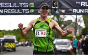27 April 2025; Sean McCreery of Rathfarnham WSAF AC, celebrates after winning the men's 50+ event during the 123.ie National Road Relay Championships in Raheny, Dublin. Photo by Tyler Miller/Sportsfile
