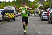 27 April 2025; Sean McCreery of Rathfarnham WSAF AC, celebrates after winning the men's 50+ event during the 123.ie National Road Relay Championships in Raheny, Dublin. Photo by Tyler Miller/Sportsfile
