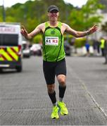27 April 2025; Sean McCreery of Rathfarnham WSAF AC, celebrates after winning the men's 50+ event during the 123.ie National Road Relay Championships in Raheny, Dublin. Photo by Tyler Miller/Sportsfile