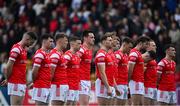 27 April 2025; Louth players stand for the playing of Amhrán na bhFiann before the Leinster GAA Football Senior Championship semi-final match between Kildare and Louth at Glenisk O'Connor Park in Tullamore, Offaly. Photo by Shauna Clinton/Sportsfile