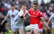 27 April 2025; Ryan Burns of Louth in action against Brian Byrne of Kildare during the Leinster GAA Football Senior Championship semi-final match between Kildare and Louth at Glenisk O'Connor Park in Tullamore, Offaly. Photo by Shauna Clinton/Sportsfile