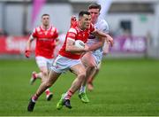 27 April 2025; Andy McDonnell of Louth in action against Colm Dalton of Kildare during the Leinster GAA Football Senior Championship semi-final match between Kildare and Louth at Glenisk O'Connor Park in Tullamore, Offaly. Photo by Shauna Clinton/Sportsfile