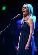 27 April 2025; Edel Nic Éanaigh sings Amhrán na bhFiann before the 2025 Scór Sinsear All-Ireland Finals at the TF Theatre in Castlebar, Mayo. Photo by Shauna Clinton/Sportsfile