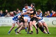 27 April 2025; Tadgh Foley of Athy is tackled by Brian Broderick of County Carlow, right, during the Bank of Ireland Provincial Towns Cup final match between Athy RFC and County Carlow FC at Forenaughts in Naas, Kildare. Photo by Seb Daly/Sportsfile