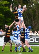 27 April 2025; Niall Dunne of Athy takes possession in a lineout ahead of County Carlow's Joel Brown during the Bank of Ireland Provincial Towns Cup final match between Athy RFC and County Carlow FC at Forenaughts in Naas, Kildare. Photo by Seb Daly/Sportsfile