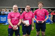 27 April 2025; Referee Ian Thompson, centre, with assistants Jason Teahan, left, and Ciaran O'Flynn after the Bank of Ireland Provincial Towns Cup final match between Athy RFC and County Carlow FC at Forenaughts in Naas, Kildare. Photo by Seb Daly/Sportsfile