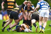 27 April 2025; Ben Crotty of County Carlow is tackled by Craig Miller of Athy during the Bank of Ireland Provincial Towns Cup final match between Athy RFC and County Carlow FC at Forenaughts in Naas, Kildare. Photo by Seb Daly/Sportsfile