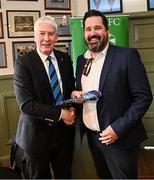 27 April 2025; Leinster Branch president Declan Gardiner presents a tie to Gavin Leech, Bank of Ireland, before the Bank of Ireland Provincial Towns Cup final match between Athy RFC and County Carlow FC at Forenaughts in Naas, Kildare. Photo by Seb Daly/Sportsfile