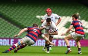 27 April 2025; Billy Scannell of Cork Constitution is tackled by Callum Smith and Sam Owens of Clontarf during the Energia All-Ireland League Men's Division 1A final match between Clontarf and Cork Constitution at the Aviva Stadium in Dublin. Photo by Matt Browne/Sportsfile