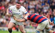 27 April 2025; Charlie Connolly of Cork Constitution is tackled by Callum Smith of Clontarf during the Energia All-Ireland League Men's Division 1A final match between Clontarf and Cork Constitution at the Aviva Stadium in Dublin. Photo by Matt Browne/Sportsfile