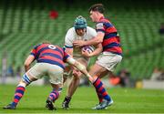 27 April 2025; Sean Duffy of Cork Constitution is tackled by Callum Smith and Aaron Coleman of Clontarf during the Energia All-Ireland League Men's Division 1A final match between Clontarf and Cork Constitution at the Aviva Stadium in Dublin. Photo by Matt Browne/Sportsfile