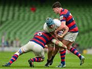 27 April 2025; Sean Duffy of Cork Constitution is tackled by Callum Smith and Aaron Coleman of Clontarf during the Energia All-Ireland League Men's Division 1A final match between Clontarf and Cork Constitution at the Aviva Stadium in Dublin. Photo by Matt Browne/Sportsfile
