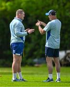 28 April 2025; Jack Boyle, left, and senior coach Jacques Nienaber during Leinster rugby squad training at UCD in Dublin. Photo by Brendan Moran/Sportsfile