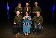 27 April 2025; The Sráid an Mhuilinn team, including John Tarrant, Pat Sheehan, Con Healy and Jerry Doody, representing Cork and Munster, are presented with their trophy by Uachtarán Chumann Lúthchleas Gael Jarlath Burns and Cathaoirleach Coiste Náisiúnta Scór Paula Magee after their victory in the Tráth na gCeist competition during the 2025 Scór Sinsear All-Ireland Finals at the TF Theatre in Castlebar, Mayo. Photo by Shauna Clinton/Sportsfile