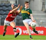28 April 2025; Ciaran Collins of Kerry in action against Colm Clifford of Cork during the Dalata Hotel Group Munster GAA Football U20 Championship final match between Cork and Kerry at SuperValu Páirc Ui Chaoimh in Cork. Photo by Matt Browne/Sportsfile
