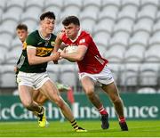 28 April 2025; Niall O'Shea of Cork in action against Ronan Carroll of Kerry during the Dalata Hotel Group Munster GAA Football U20 Championship final match between Cork and Kerry at SuperValu Páirc Ui Chaoimh in Cork. Photo by Matt Browne/Sportsfile