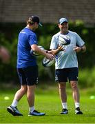 28 April 2025; Senior coach Jacques Nienaber, right, and assistant coach Tyler Bleyendaal during Leinster rugby squad training at UCD in Dublin. Photo by Brendan Moran/Sportsfile