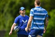 28 April 2025; Assistant coach Tyler Bleyendaal, left, with RG Snyman during Leinster rugby squad training at UCD in Dublin. Photo by Brendan Moran/Sportsfile